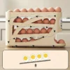 S8dc33b7873784606b1ef24d1314cd29e2.webp 3-Tier Rolling Egg Holder โ Smart & Space-Saving Egg Storage Rack